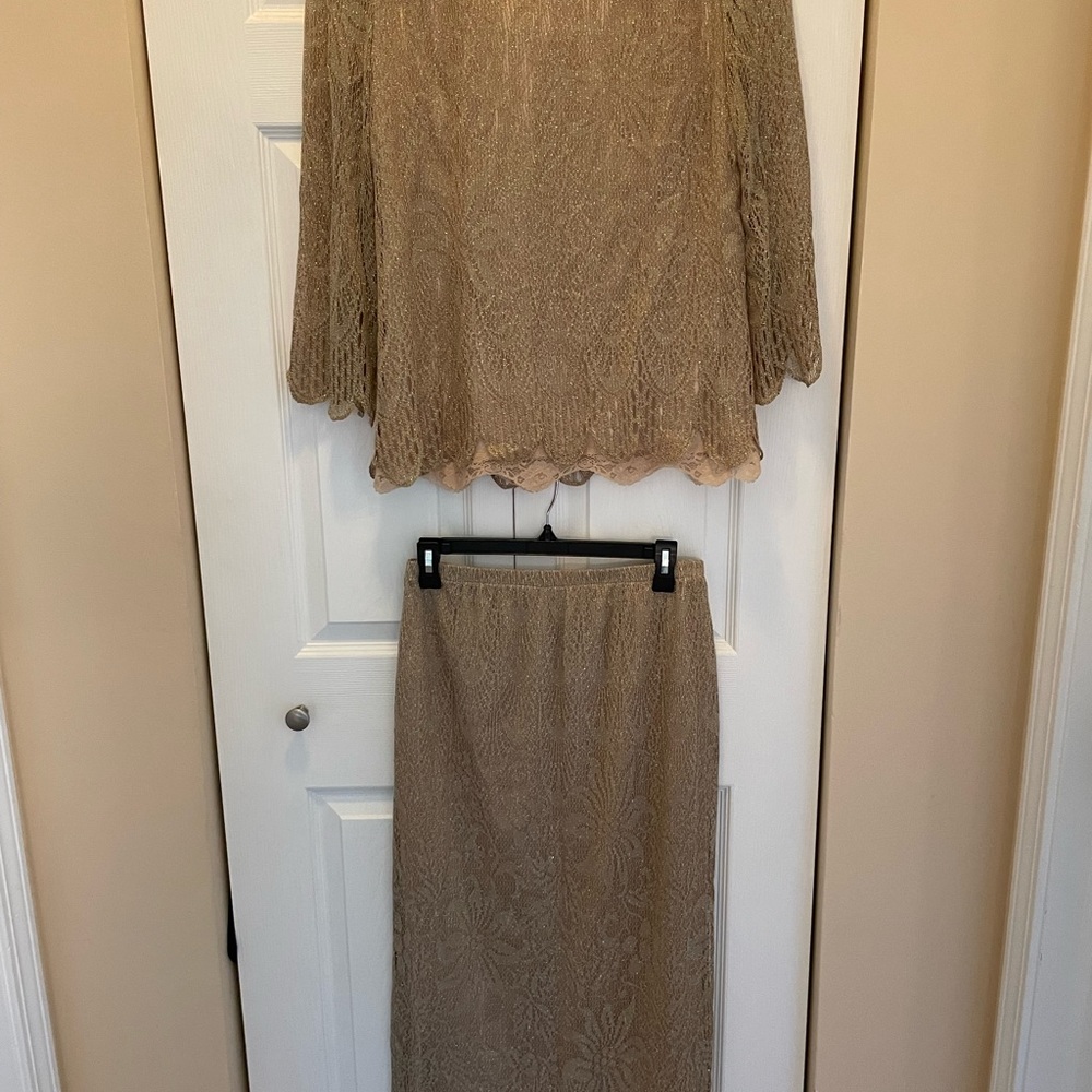 Beautiful lace design two piece gold outfit.